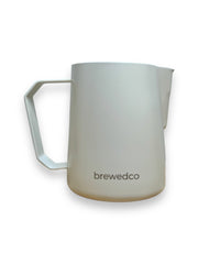 Brewedco Milk Pitcher that incorporates a sharp spout for pouring latte art